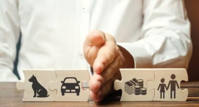 Person dividing property icons with his hand