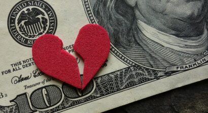 Cracked heart on money