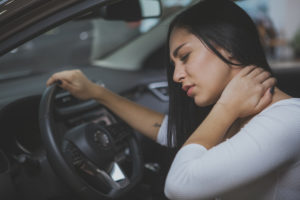 Woman with sore neck