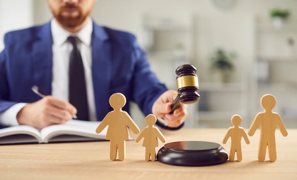 In family court, a lawyer delivers a verdict on divorce proceedings.