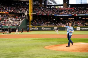 Michael Galyen Throws Out First Pitch at Rangers’ Game