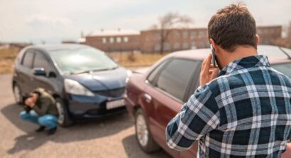 Car accident on Bedford road, a driver calling on phone