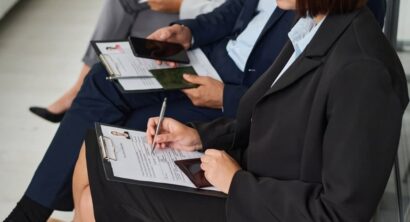 People filling documents to get visa