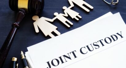 Joint custody. Documents, figure of family and gavel.