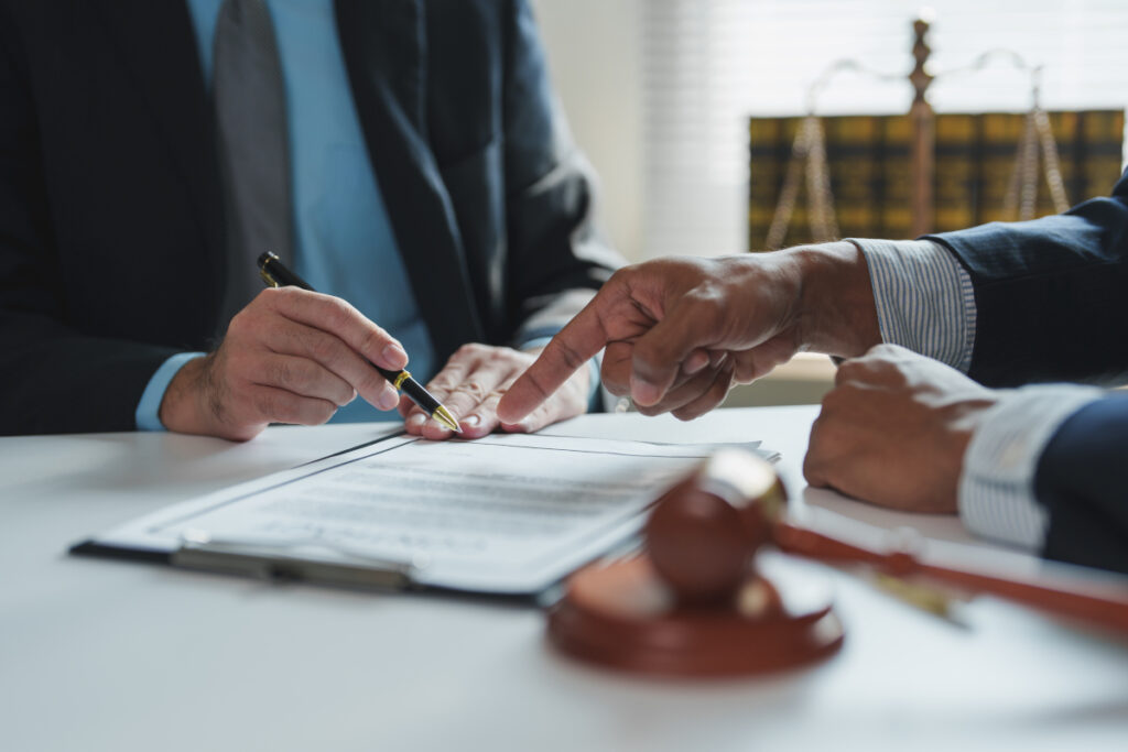 Avoiding Probate in Texas: Legal Strategies Every DFW Family Should Consider. Legal professionals reviewing contract terms, ensuring compliance and agreement before signing.