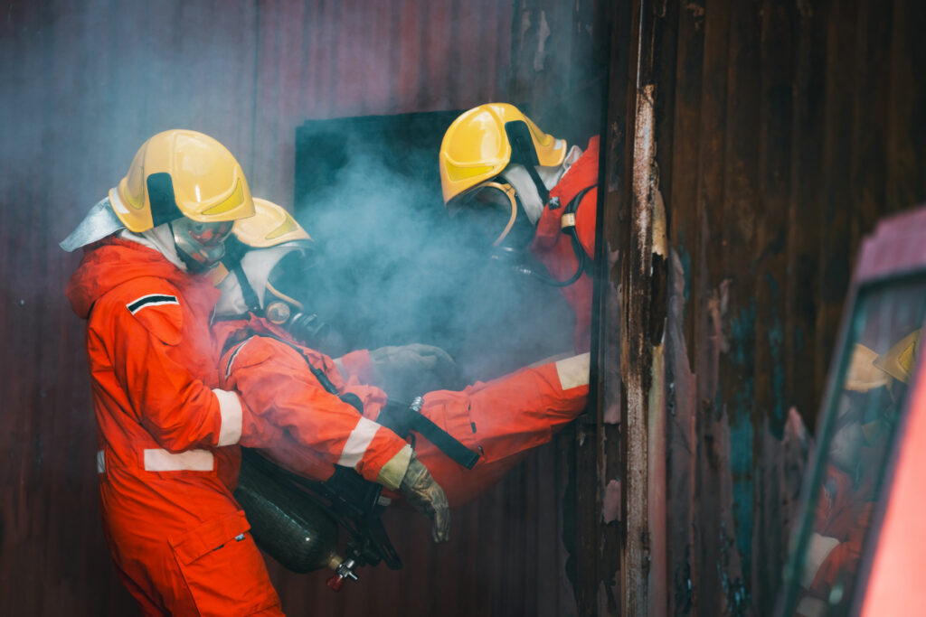 Firefighters are working together to extinguish the fire. The rescue efforts also include providing assistance to the victims.