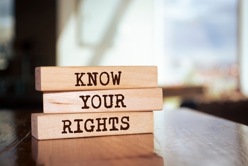Wooden blocks stacked with the words &ldquo;Know Your Rights&rdquo; printed in bold letters, symbolising legal awareness and personal empowerment.