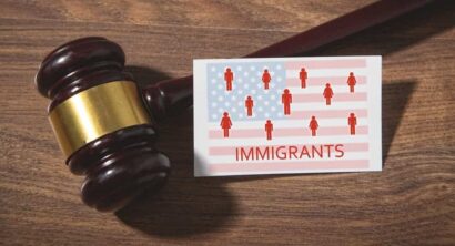 Concept of Immigrants with a people icons and US flag.