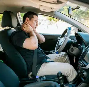 male driver with neck pain