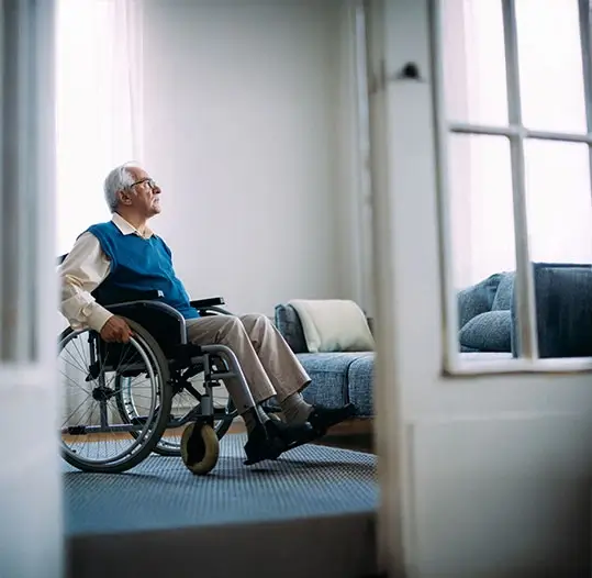 elderly man in wheelchair