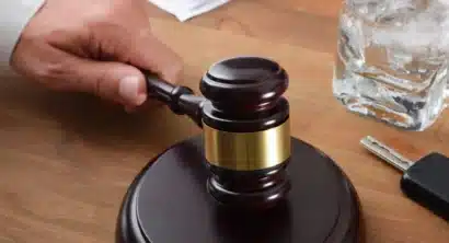 judge gavel, glass of alcohol and car keys