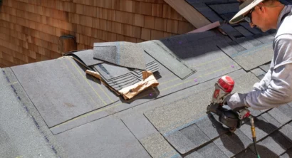 man repairing a roof